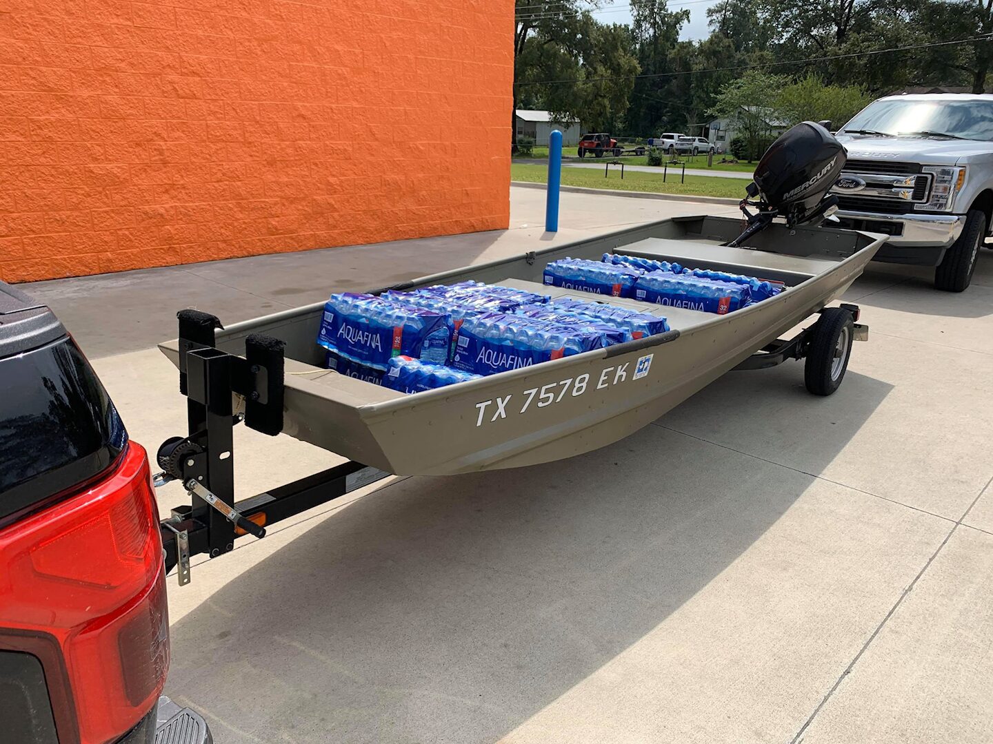 Disaster relief — Ryan Nichols delivering supplies to a flooded community