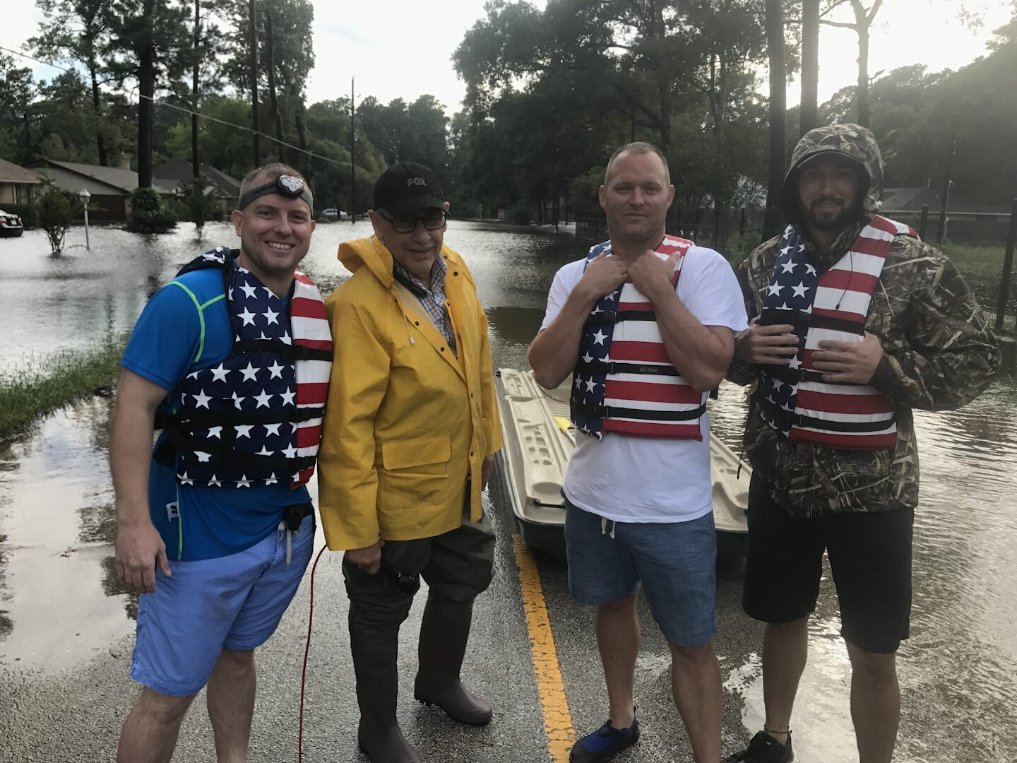 Disaster relief — Ryan Nichols delivering supplies to a flooded community