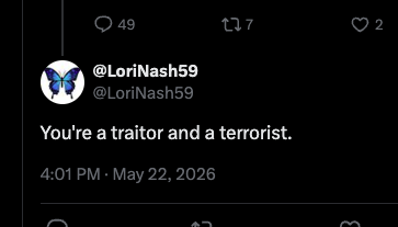 X post from LoriNash59 saying "You're a traitor and a terrorist."